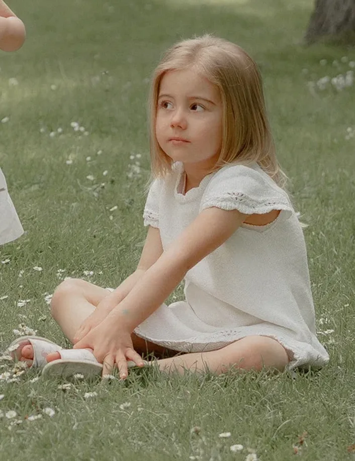 A child in the Wee Amici community