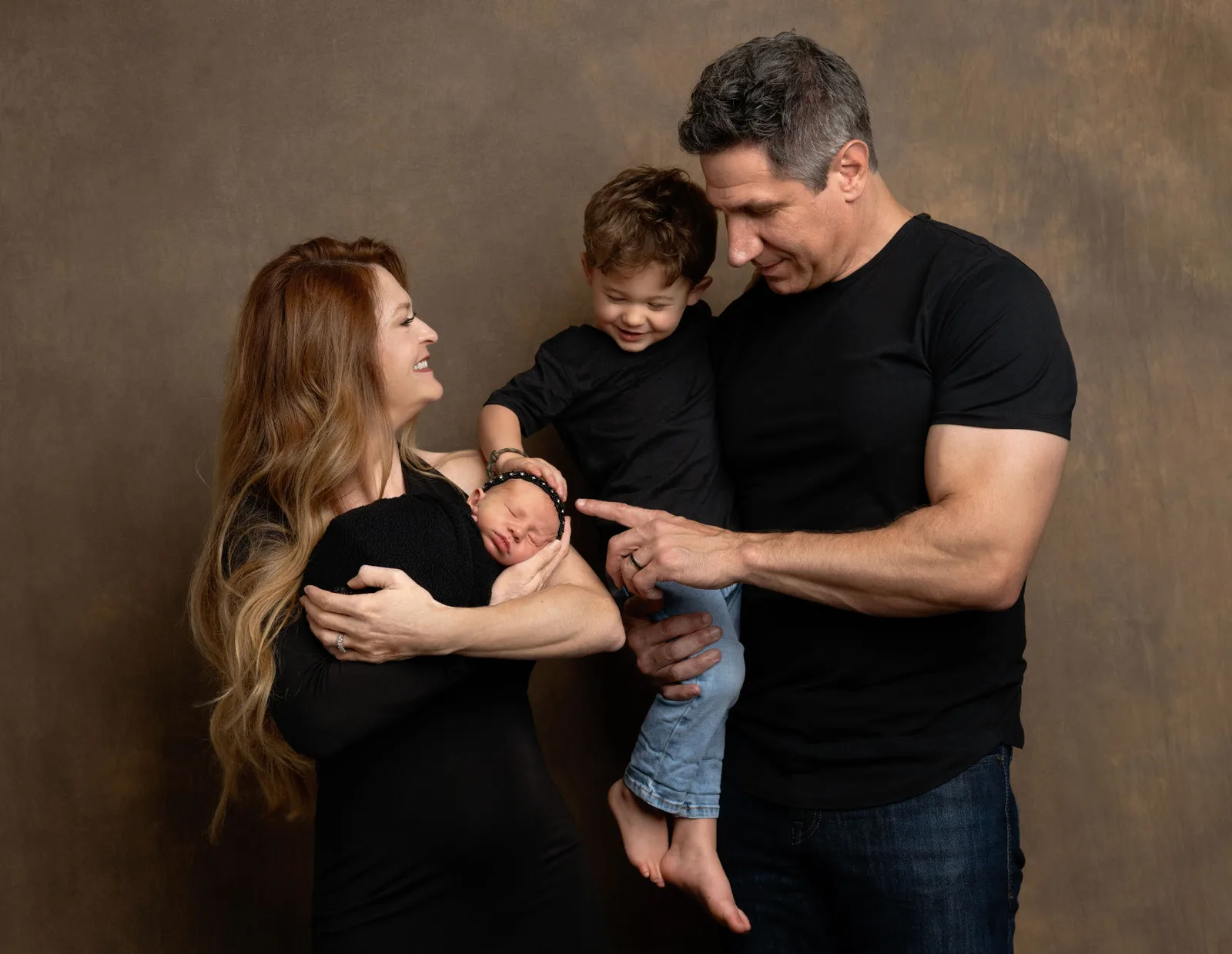 Elle Williams, founder of Wee Amici, with her husband and their two children